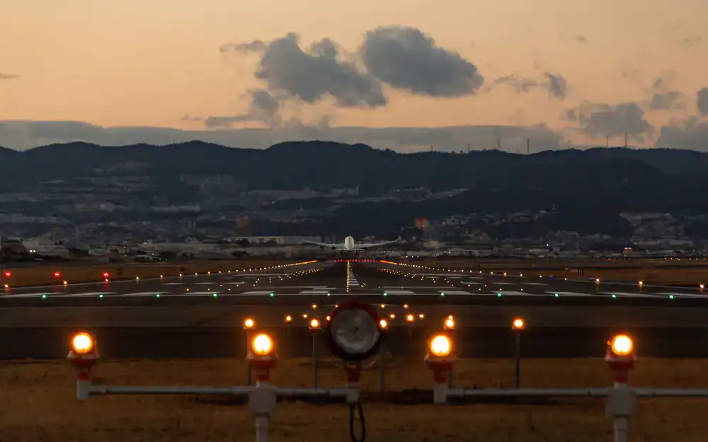 Runway threshold lights at dusk